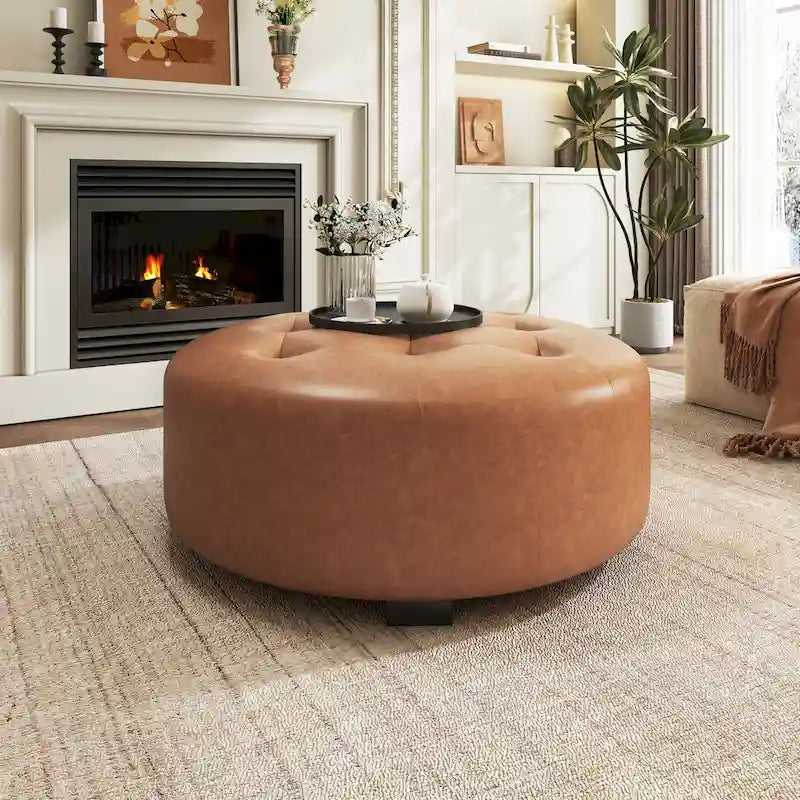 Pouffe rond capitonné en similicuir