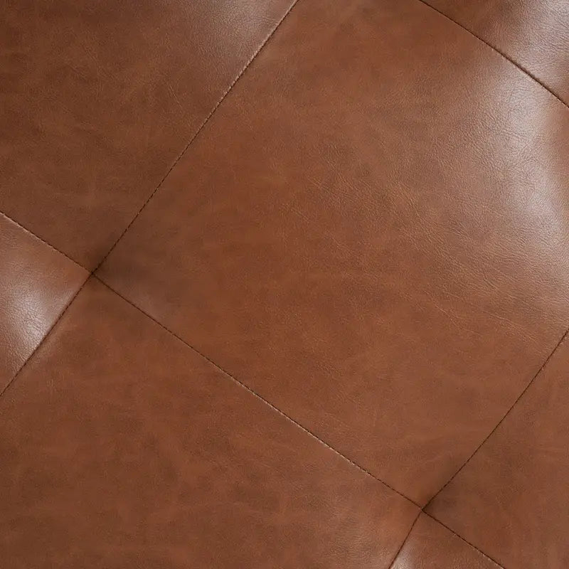 Pouffe rond capitonné en similicuir