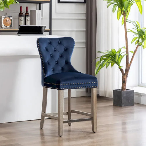 Tabouret de comptoir à dossier haut capitonné avec clous décoratifs et pieds gris antique de 61 cm
