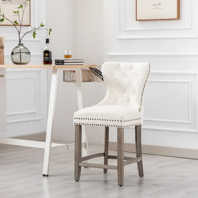 Tabouret de comptoir à dossier haut capitonné avec clous décoratifs et pieds gris antique de 61 cm